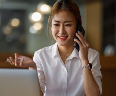 Shot of a asian young business Female working on laptop computer